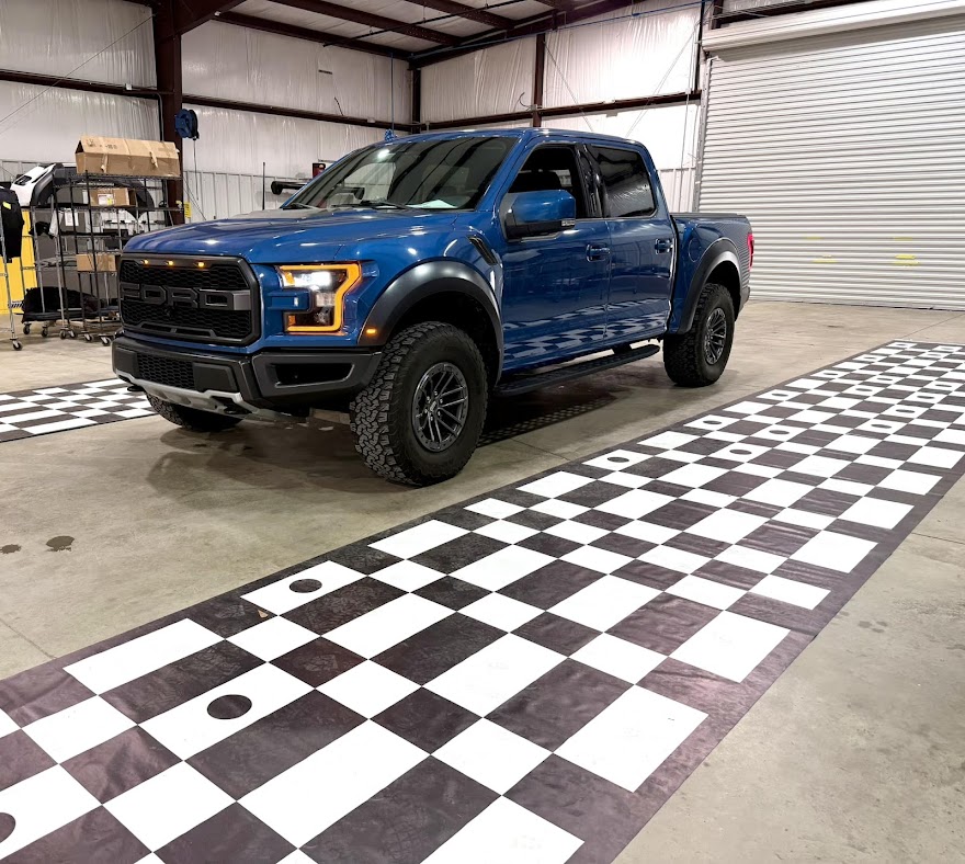 ADAS camera calibration with Ford Raptor on target mats